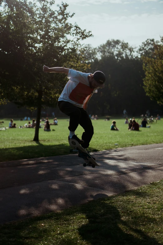 a man flying through the air while riding a skateboard