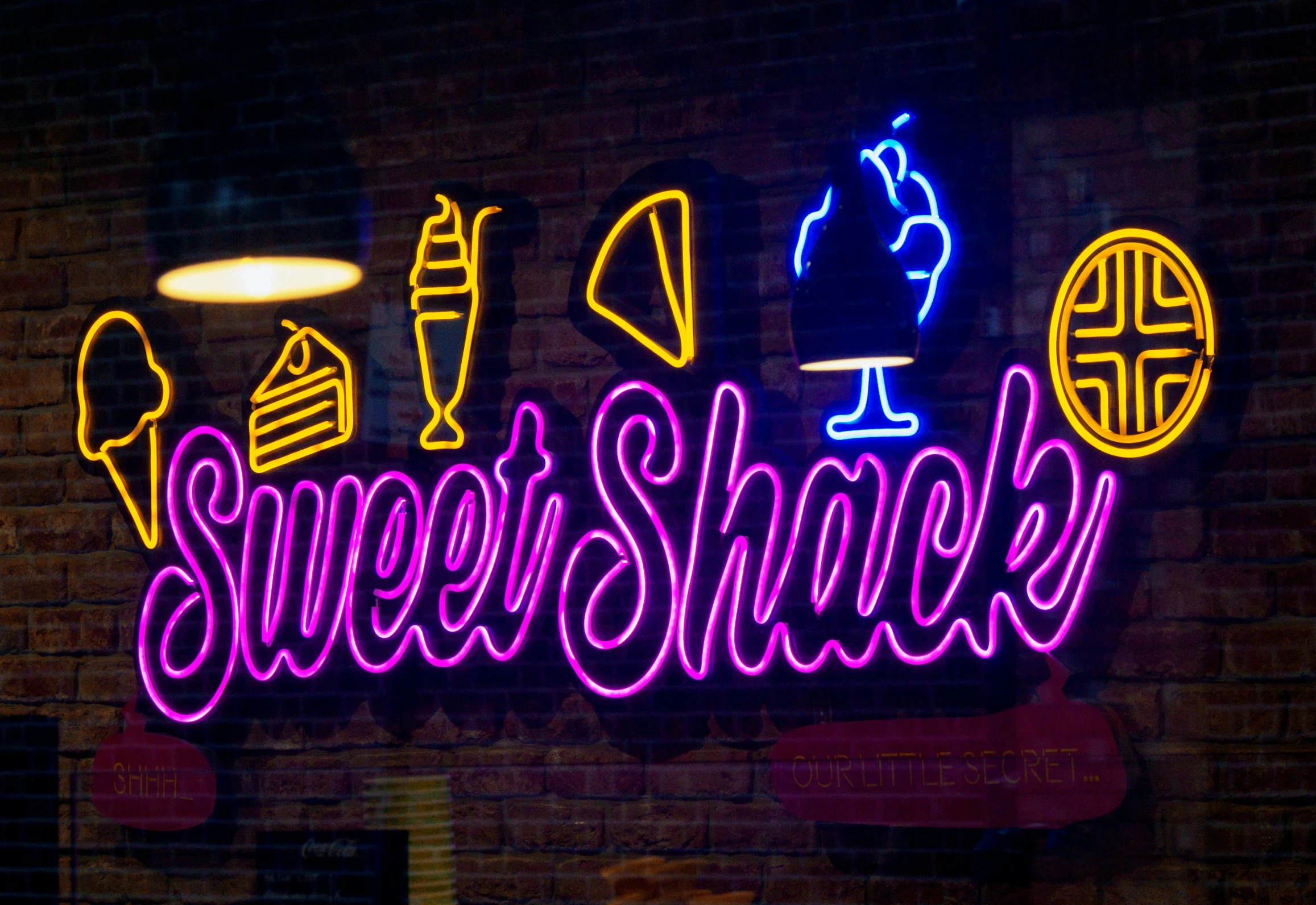 a neon sign with the words, ellshweens