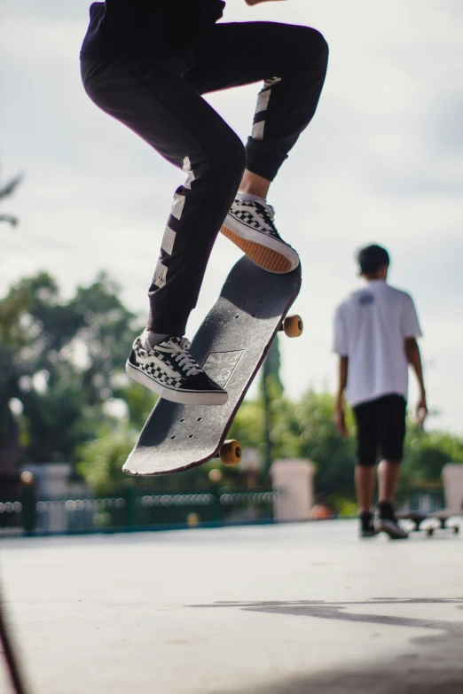 man on a skateboard doing a flip in the air