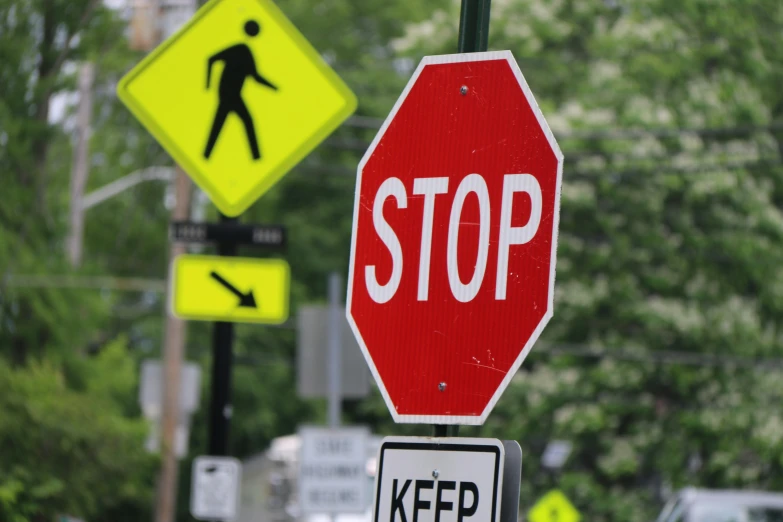 a stop sign is shown with several street signs