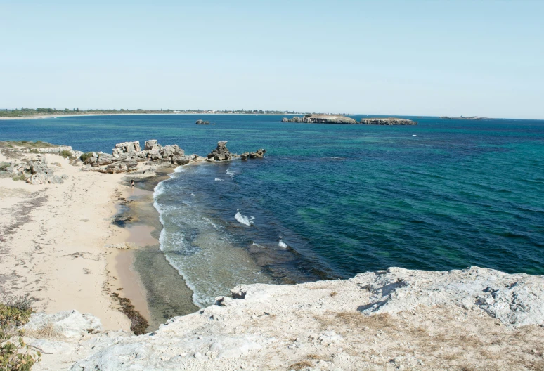 the clear blue water is very quiet on a sunny day