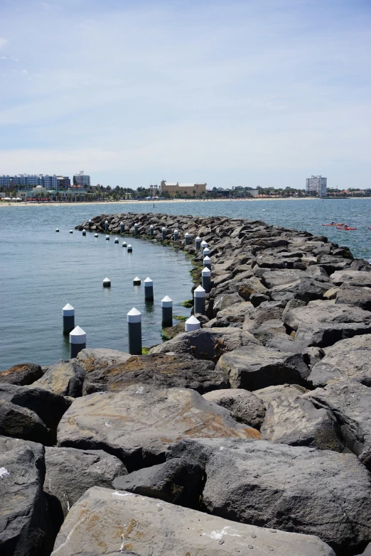 some rocks that have been placed out in the water