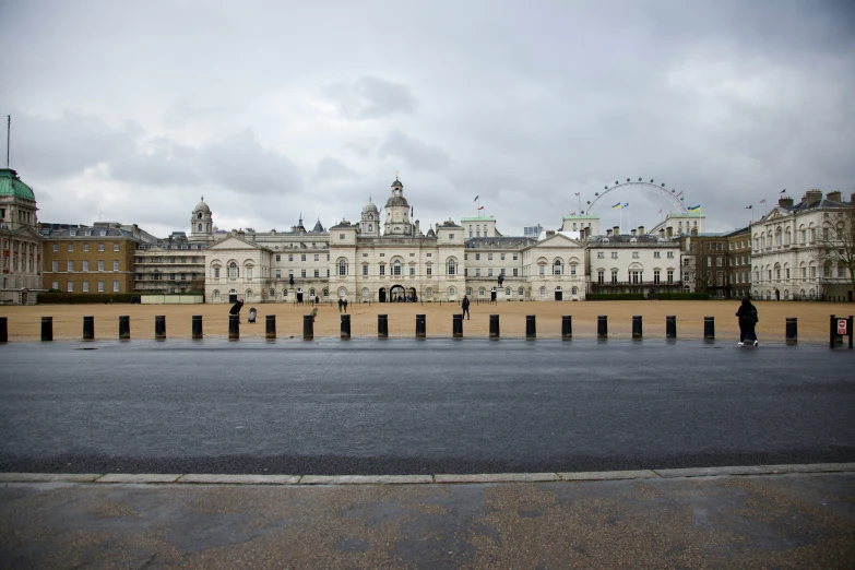 people are skateboarding in front of old buildings