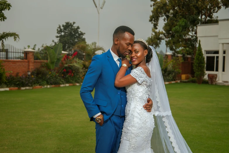 a bride and groom pose together with each other for a po