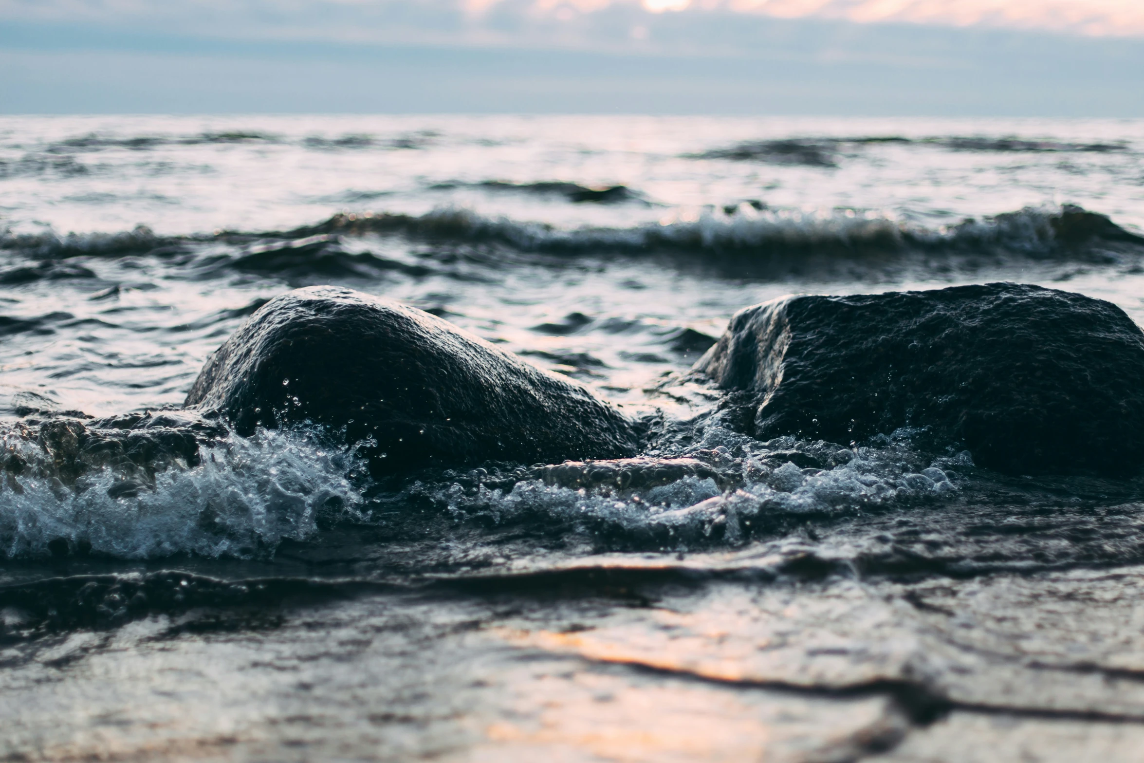 a body of water that is covered in sand