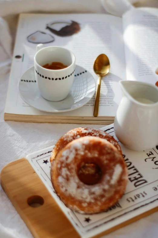 there is a doughnut and coffee on the table