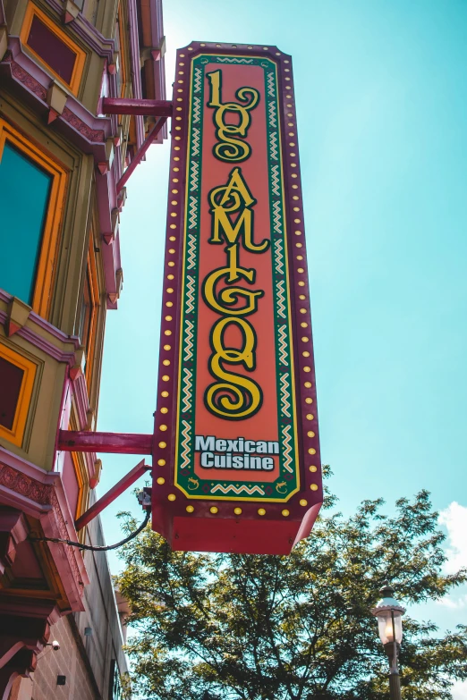 the old neon sign has ornate red trim