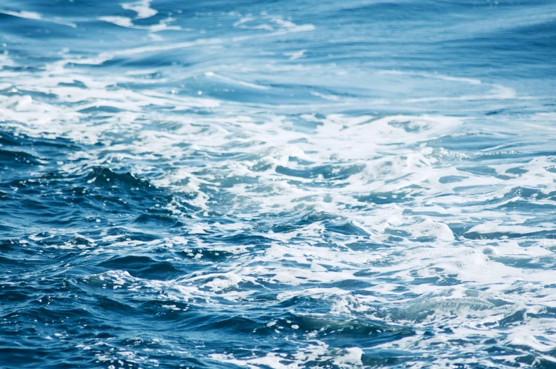 close up view of the water with small waves