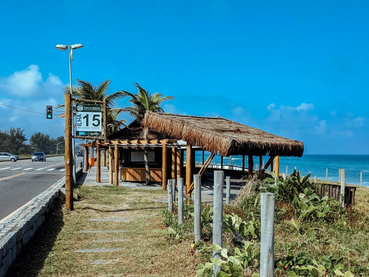 a roadside shelter is set up on a grass lawn