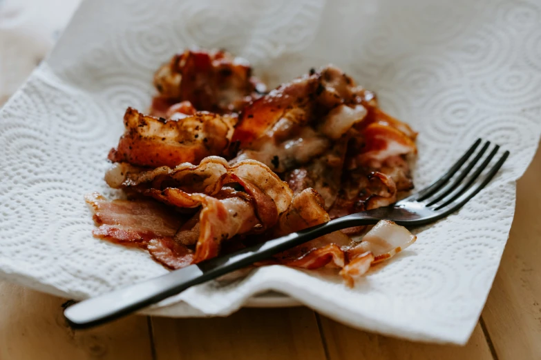 food items on a table with fork and napkin