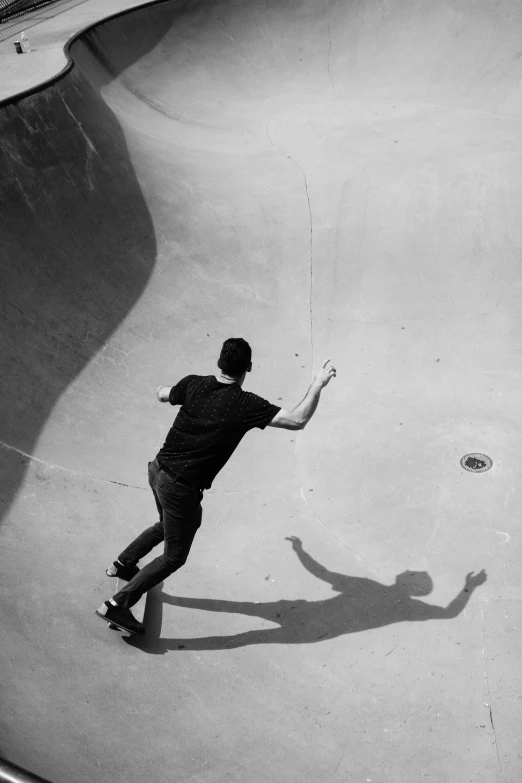 a man riding a skateboard up the side of a ramp