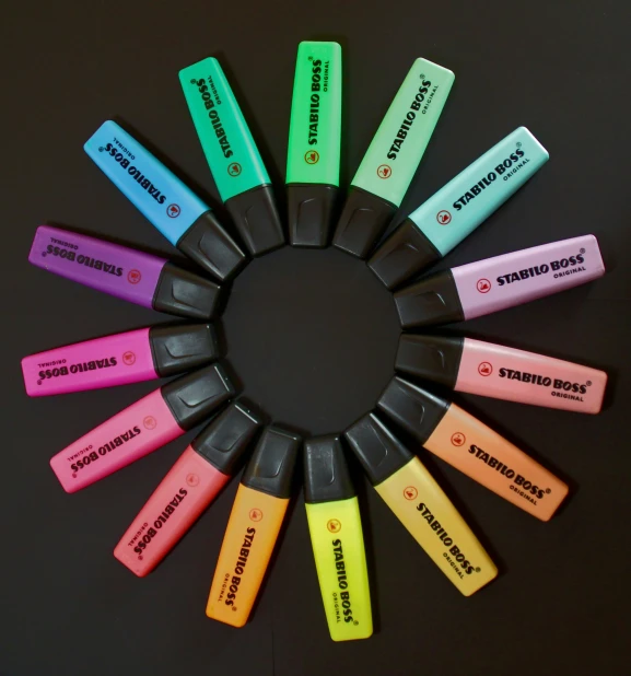 many different batteries and containers arranged in a circle