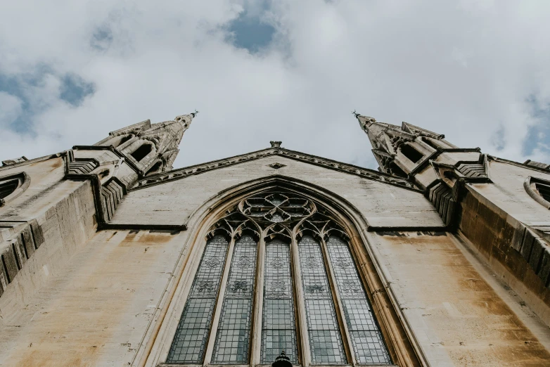 looking up into the sky at a large cathedral