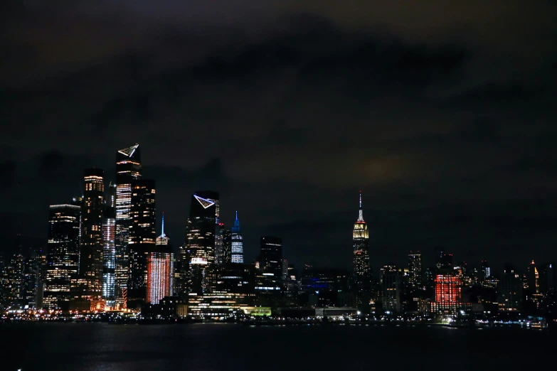 the skyline of a very large city at night