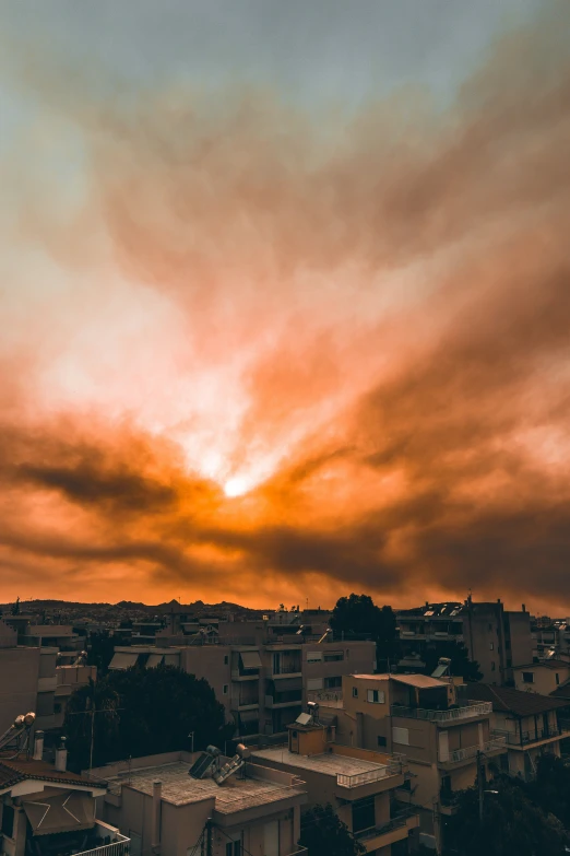 a view from a tall building at a sunset