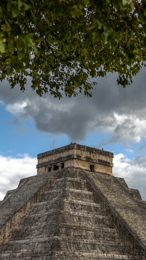 pyramid in the clouds with dark clouds