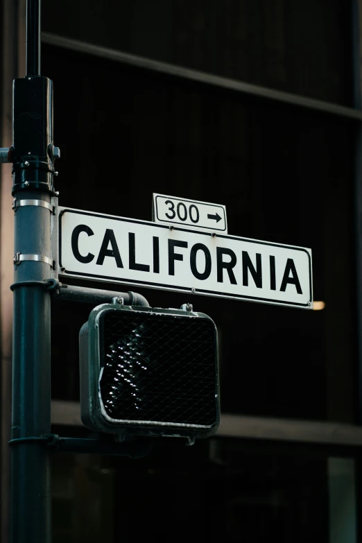 a white sign that says california and reads 30 south