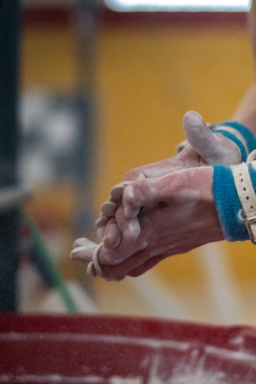 a woman in blue and white reaching out to someone