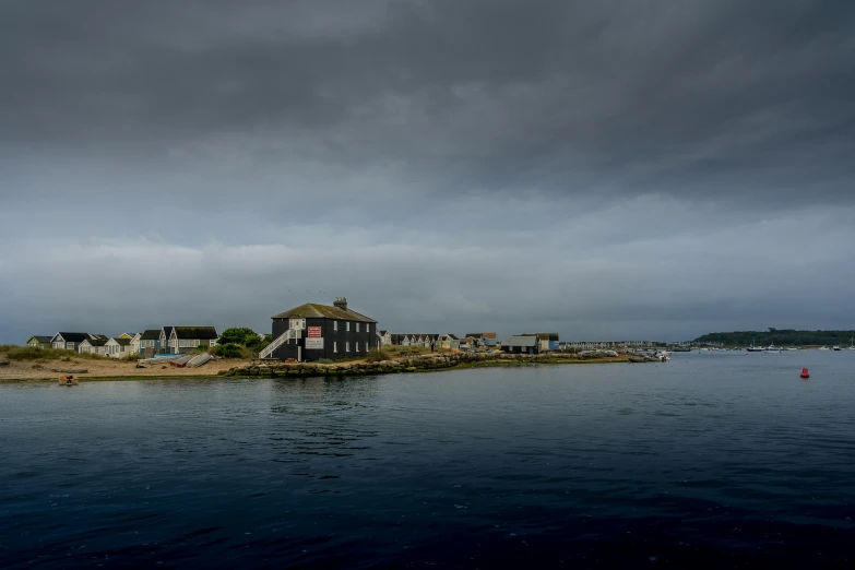 small village sits alone along the shore line