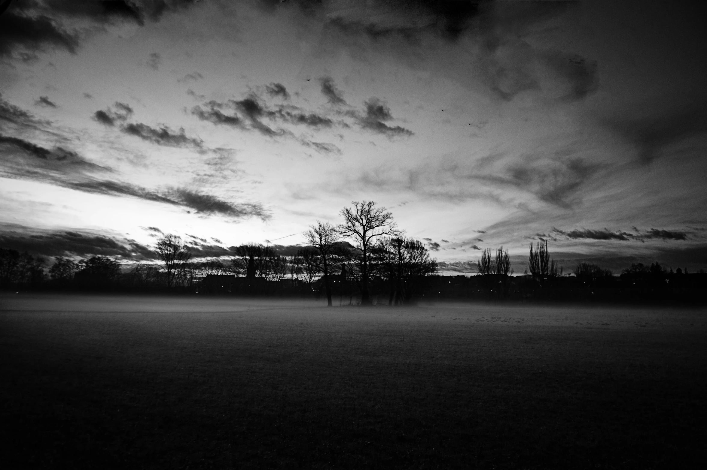 a black and white image of an empty field