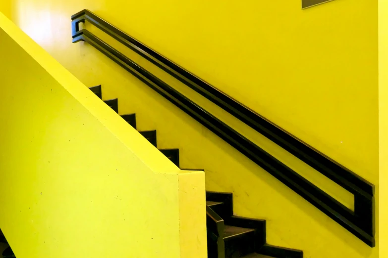 a clock sits on top of the stair rail