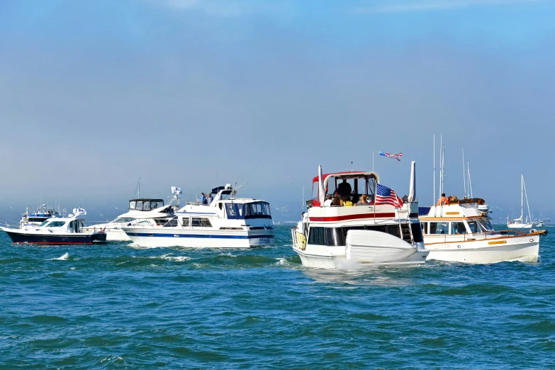 boats are sitting in the middle of the ocean