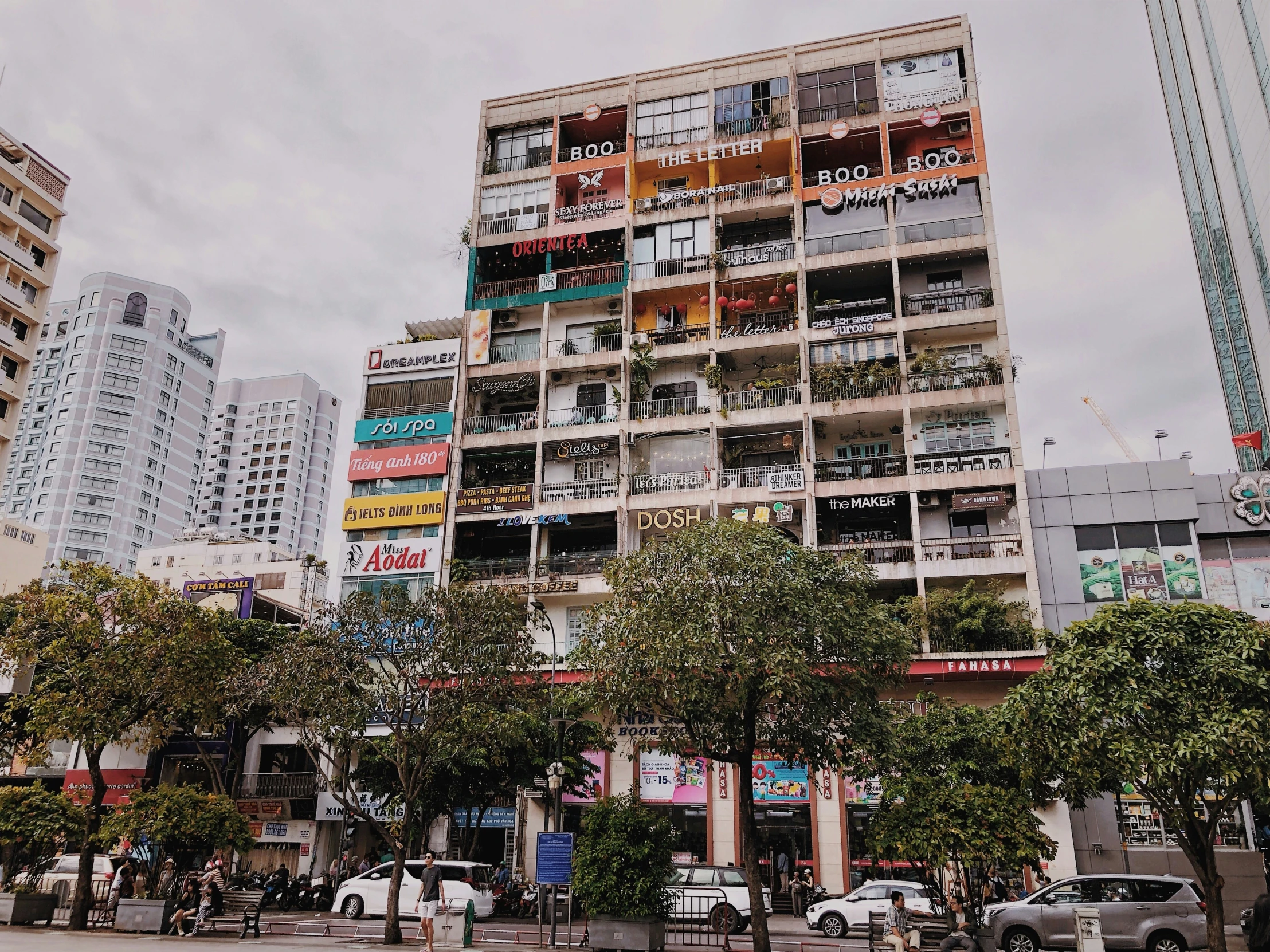 a building with multiple stories and balcony balconys