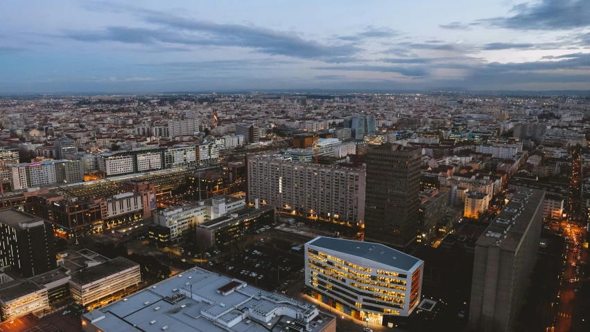 a nighttime aerial po of a city skyline