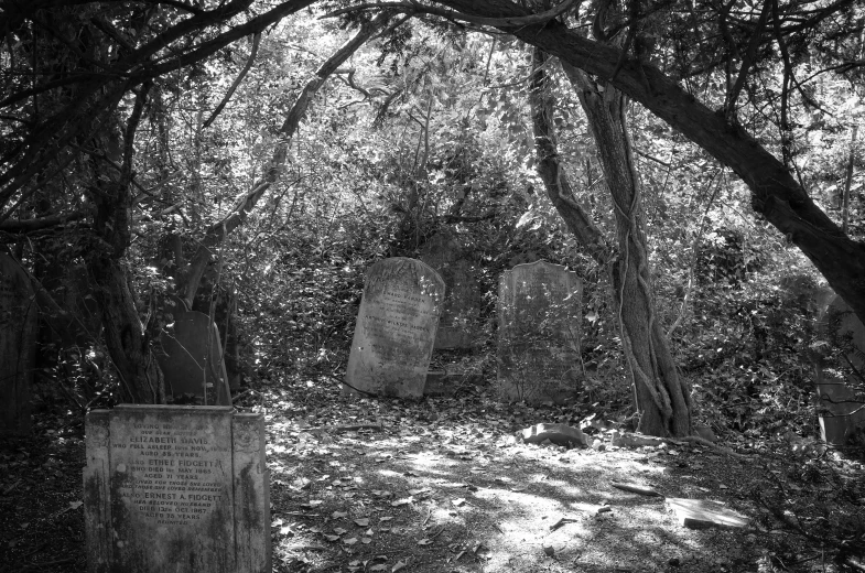 a black and white po of an old cemetery