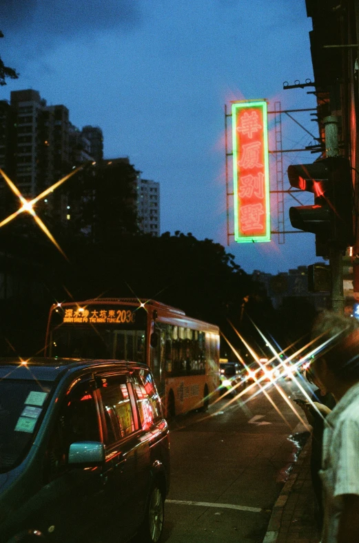 the city street is lit up with light traffic