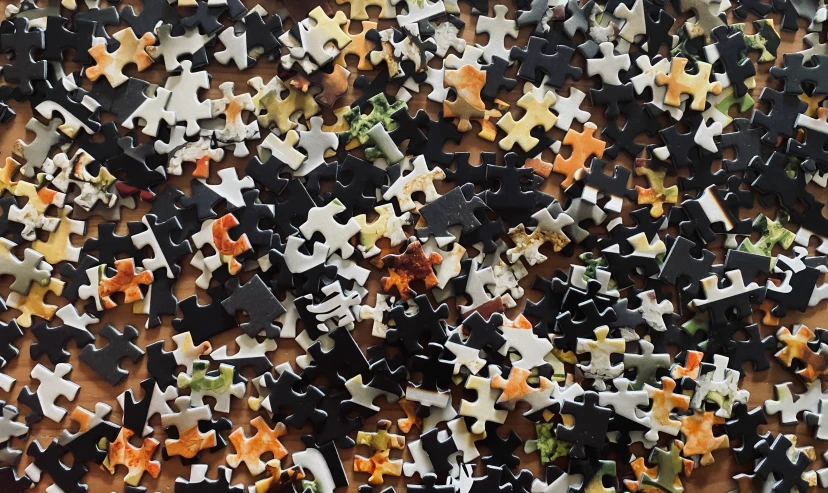 a closeup po of pieces of a jigsaw puzzle