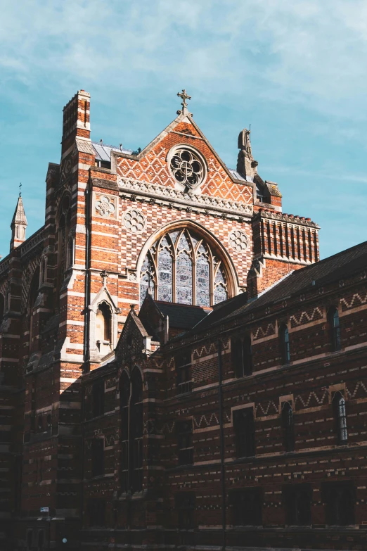 the roof and side of a building with a clock