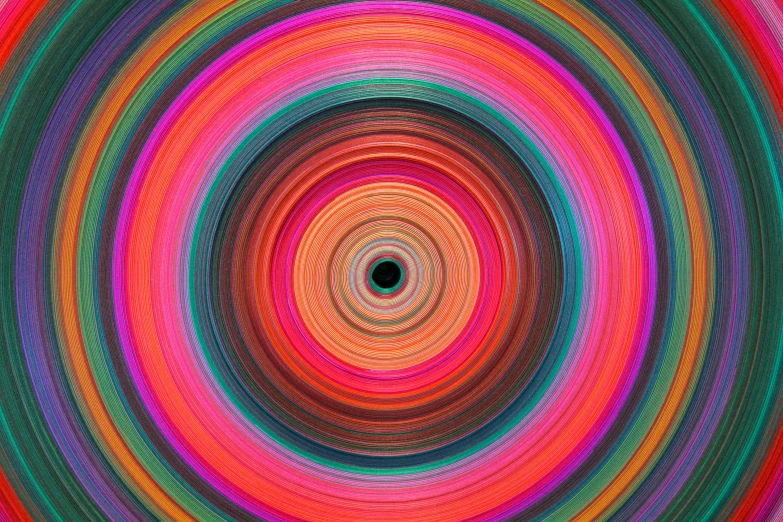 a computer generated image of a colorful pattern with the center spinning into a black hole