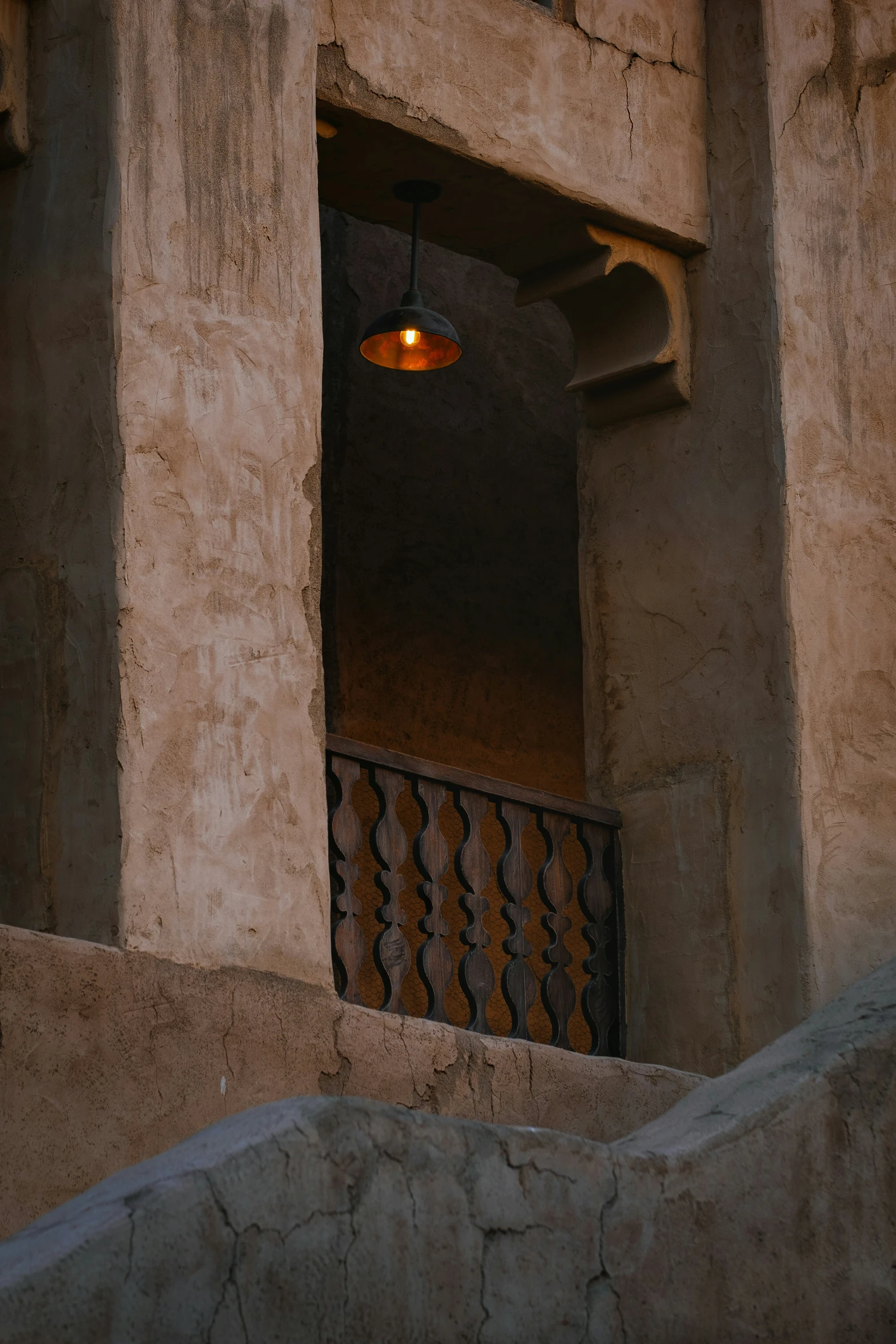 a doorway is pictured in this stucco building