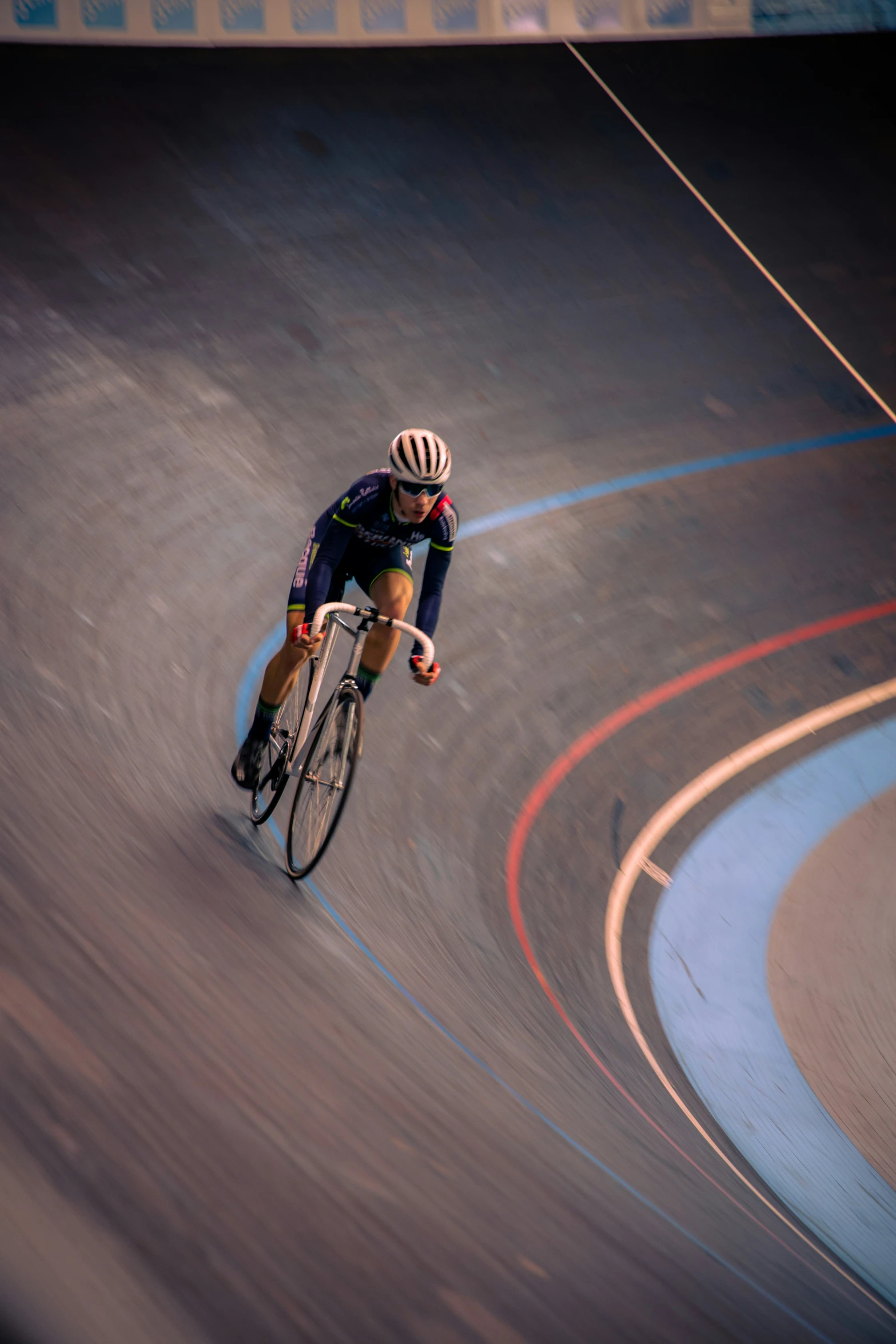 a man riding a bicycle on a track