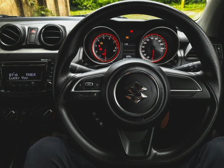 the inside view of a car shows a dash board