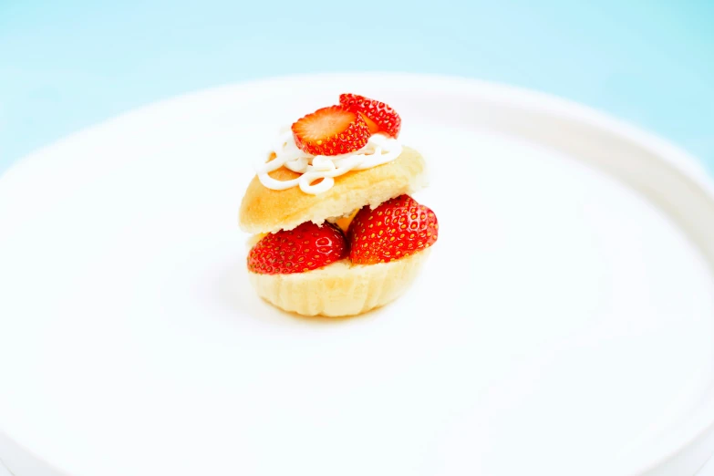 an unusual pastry is served on a white plate