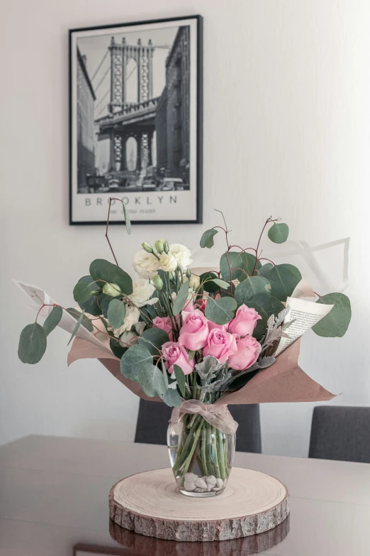 bouquet of flowers on a wooden table in a room