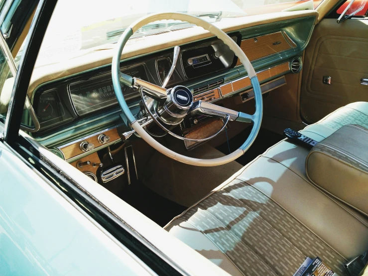 a close up of a steering wheel in a car