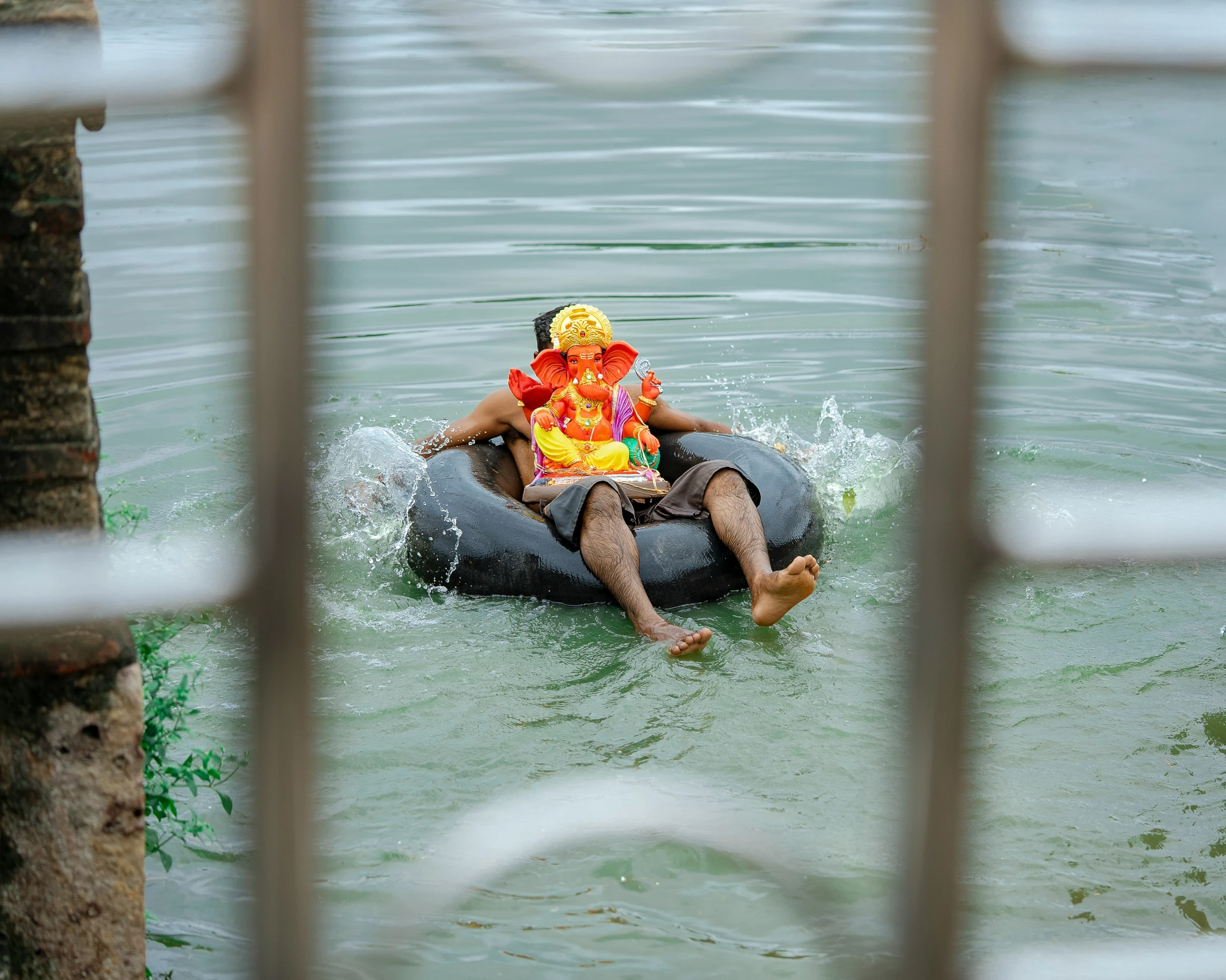 a man and a woman riding an inflatable raft