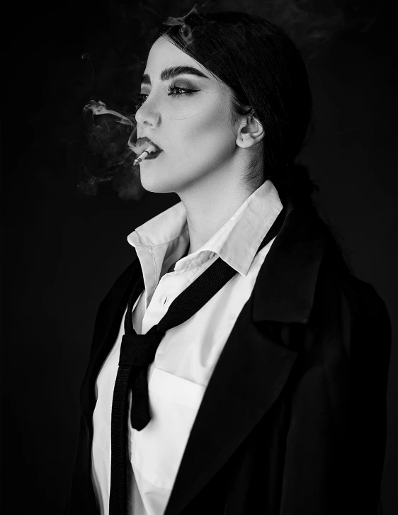 a woman smoking a cigarette with black hair