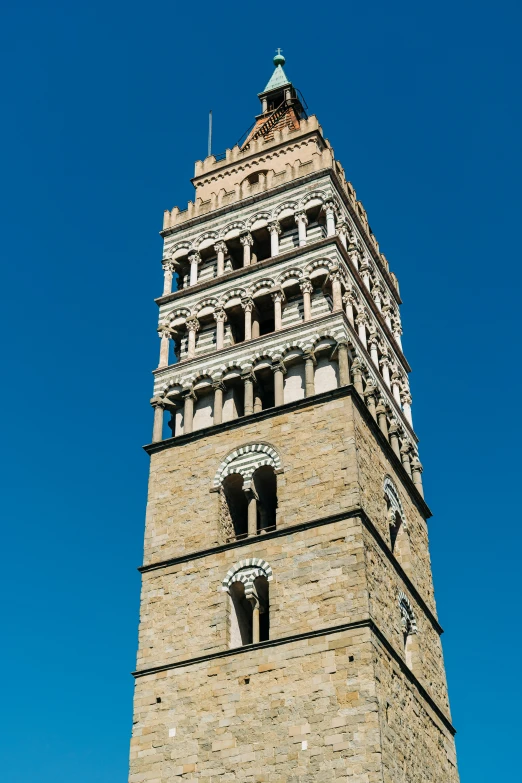 tall brick tower with a sky in the background