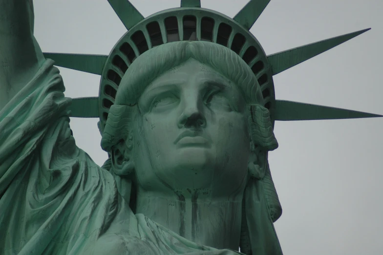 a po of the statue of liberty taken from below