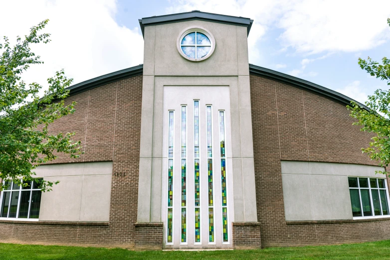 a round building with a small clock on top