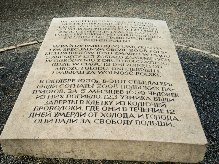 some type of memorial stone with a poem in it