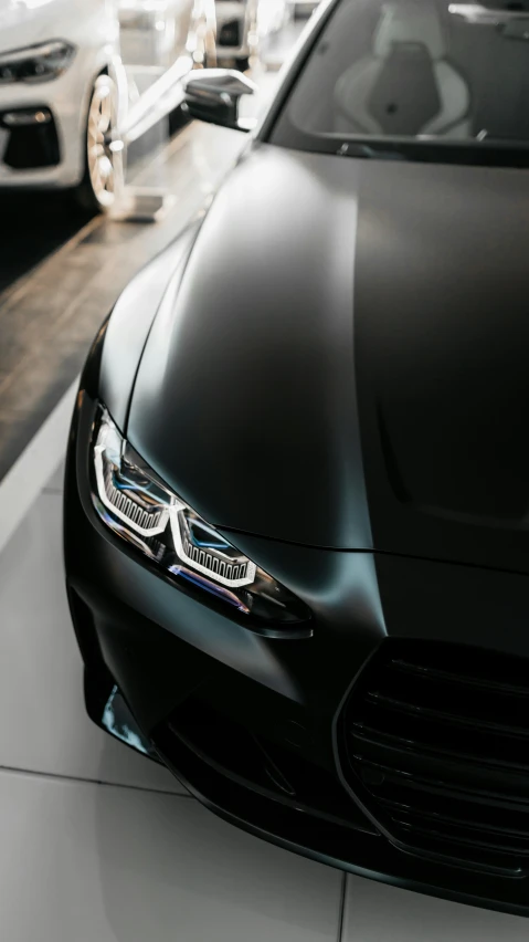 a close up of a car's headlights on display