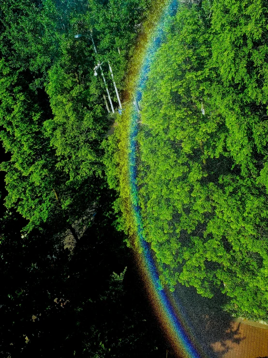 rainbow in the distance seen from above looking down