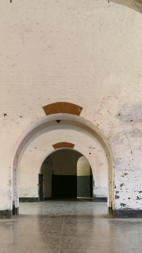 a hallway that has some kind of tunnel in it