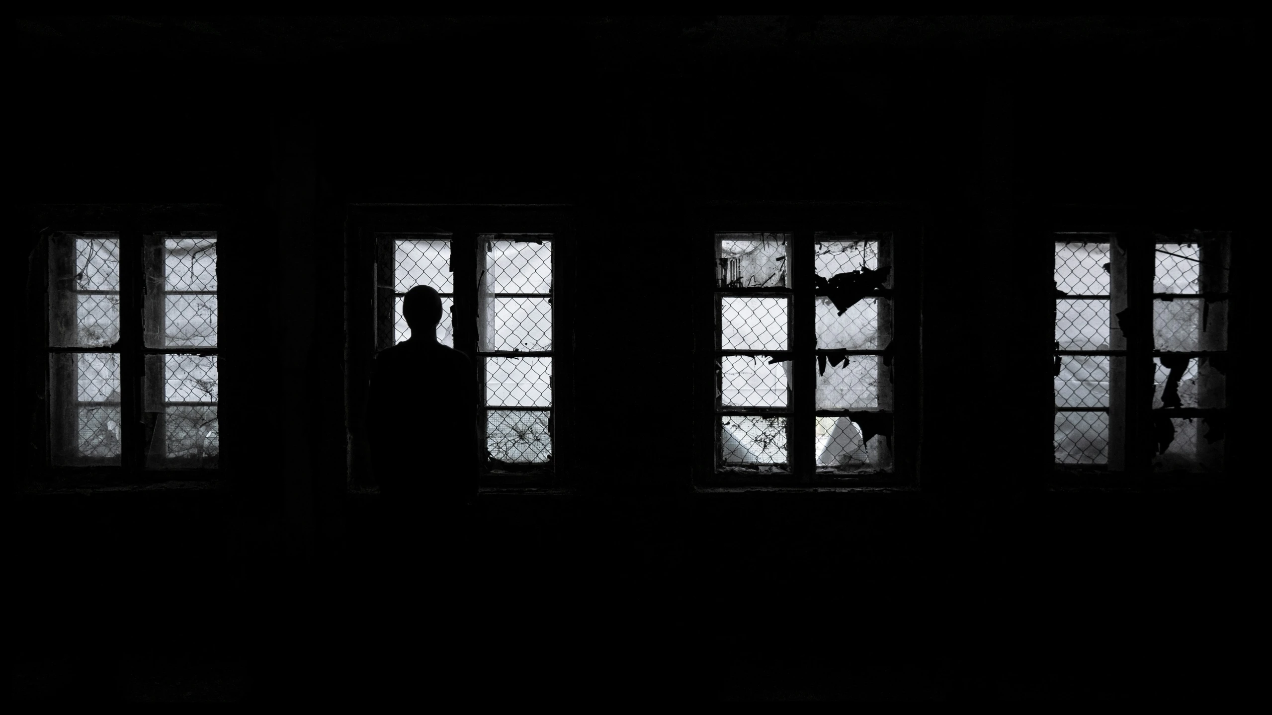 black and white po of two windows in the dark