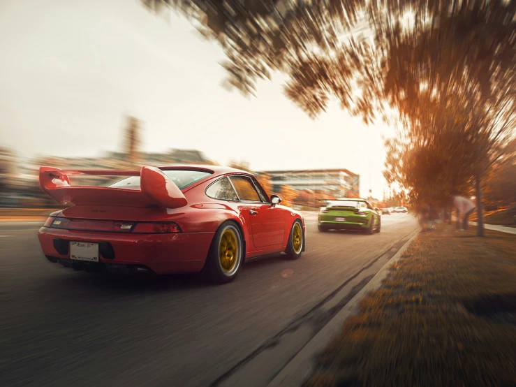 a group of cars driving on a street